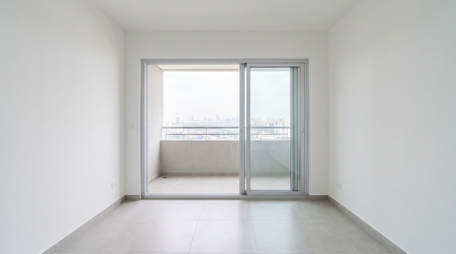 Empty new Malaysian condo unit before handover with bare walls, the stage when a smart home handover spec for neutrals and network points is cheapest